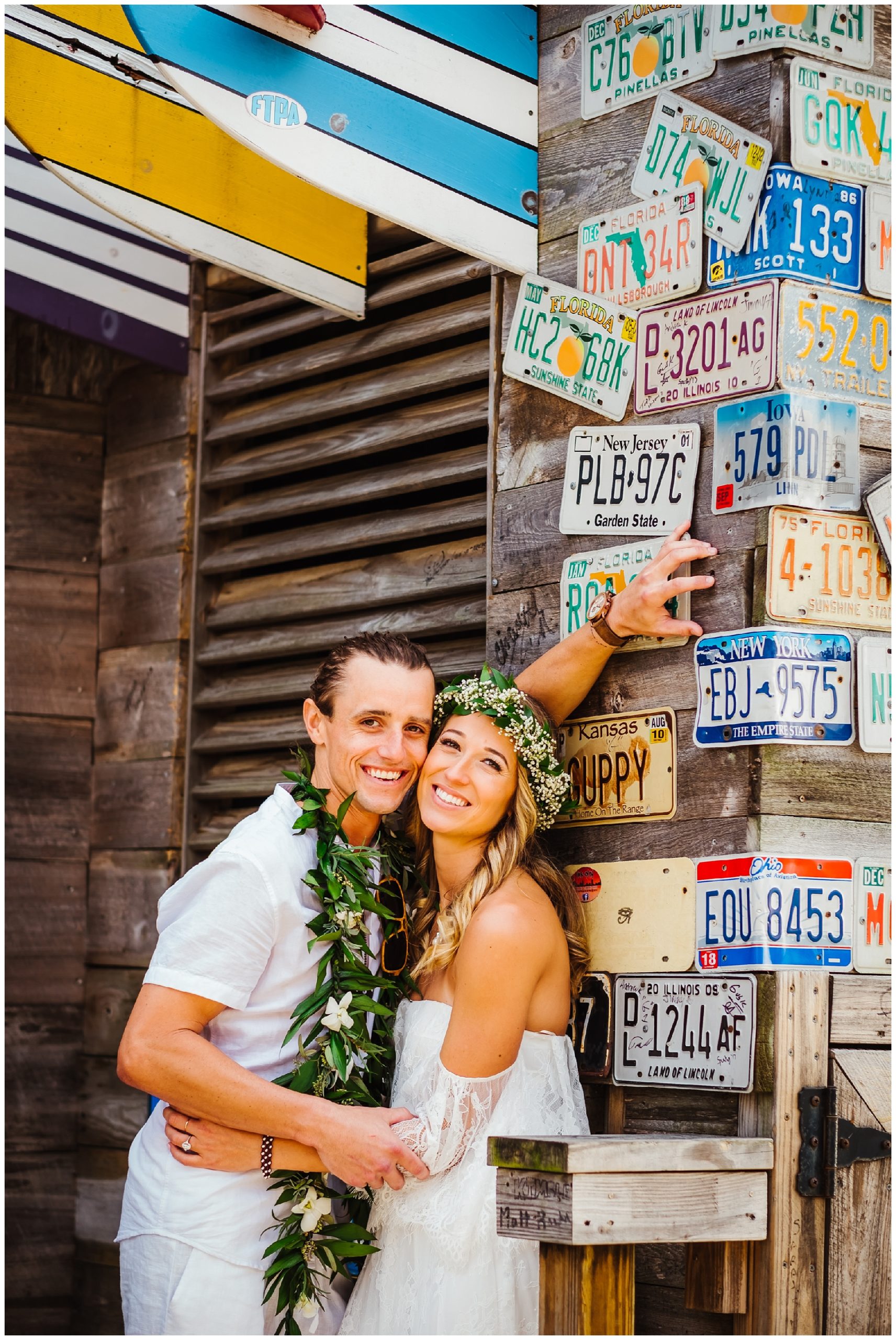 tampa-bay-wedding-photographer-barefoot-post-card-inn-tropical-hawaiin-lei-pink-pineapples-flower-crown_0155.jpg